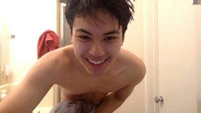 Handsome guy masturbates then takes a shower