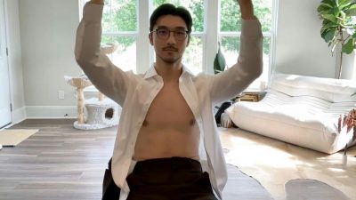 Handsome muscular Asian office guy jerking off